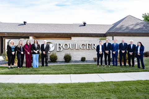 Intern Funeral Director Torrie Mack, Licensed Funeral Directors, Hollin Irgens, Breanne Johnson, Office Manager Kelsey Braaten, Licensed Funeral Directors Jeff Baer, Tia Lopez, Marty Baumgartner, Nick Kinnen, Owner & Licensed Funeral Director Jim Boulger, Licensed Funeral Director Larry Boulger, & Intern Funeral Director Isabelle Peterson, Boulger Funeral Home, Fargo, ND