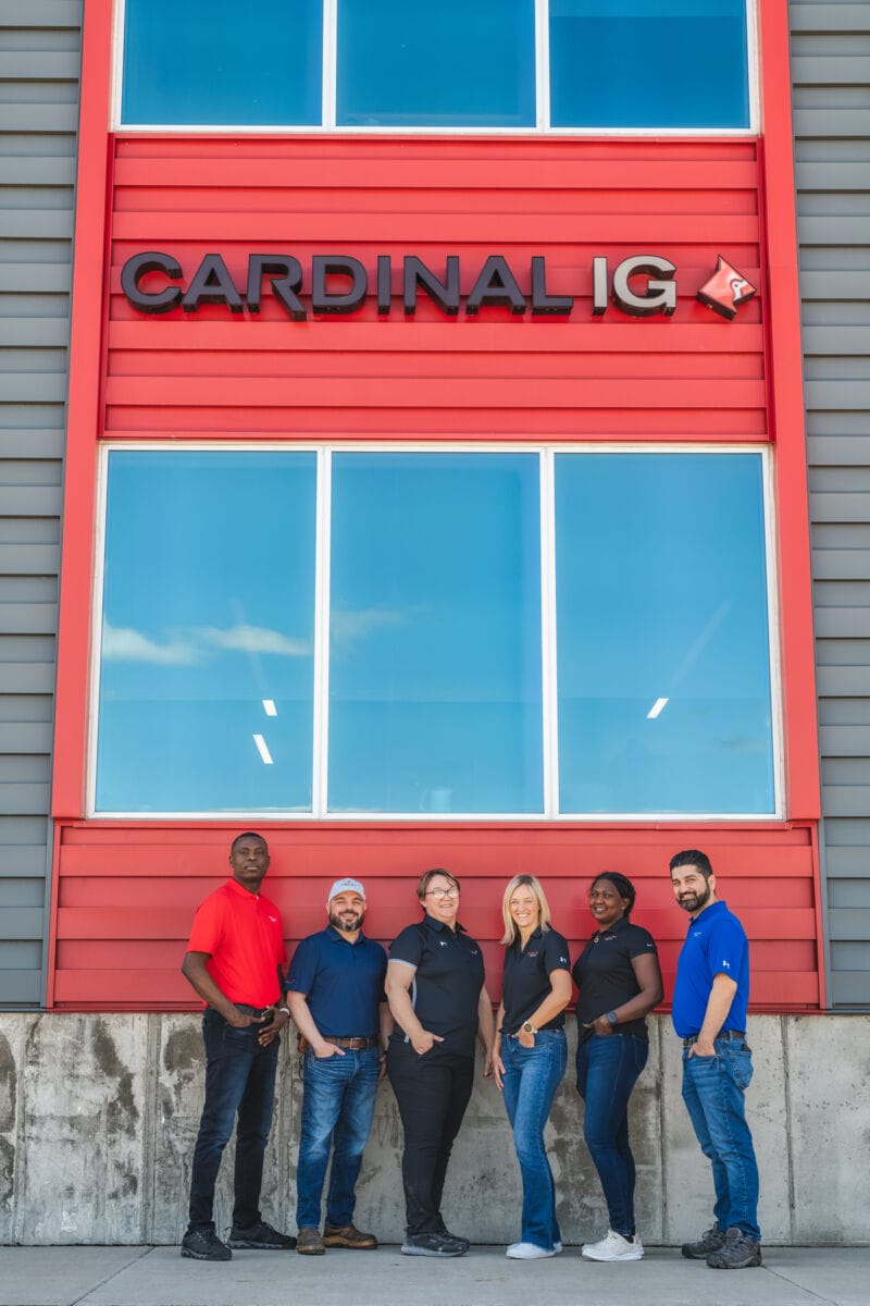 group_standing_in_front_of_building_saying_cardinal_ig